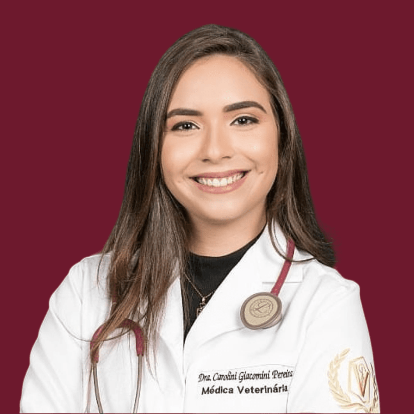 Portrait of a smiling female veterinarian in her mid-30s with a stethoscope.